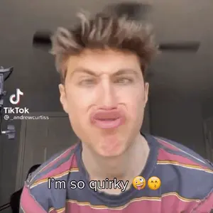 A Man Is Making A Funny Face With The Words I 'M So Quirky