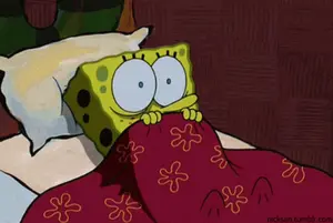 A Cartoon Of A Spongebob Squarepants Sleeping Under A Blanket