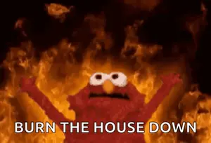 Elmo Says Burn The House Down In Front Of A Fire