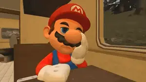 Mario Is Sitting At A Table In A Diner Holding A Donut In His Hand .