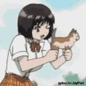 A Girl In A School Uniform Is Holding A Cat In Her Hands