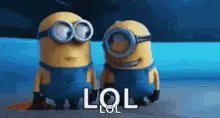 Two Minions Wearing Goggles Are Standing Next To Each Other With The Words Lol Written On The Bottom