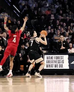 Wake Forest Greatness Is What We Do Is Displayed On The Side Of The Court