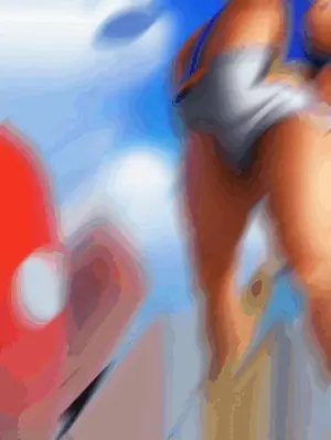 A Blurry Picture Of A Person 'S Butt And A Red Object In The Background