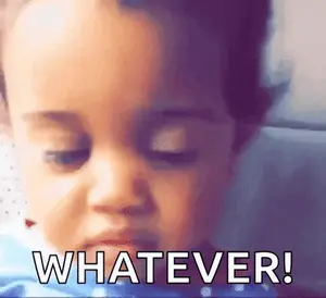 A Close Up Of A Child 'S Face With The Words " Whatever " Written Below It