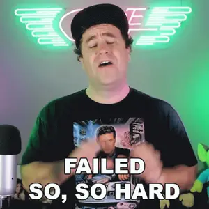 A Man Wearing A Black Shirt With A Picture Of A Man On It Says Failed So So Hard