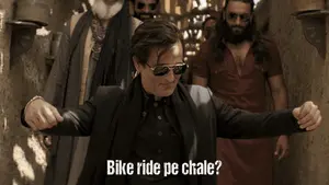 A Man Wearing Sunglasses And A Black Jacket With The Words Bike Ride Pe Chale