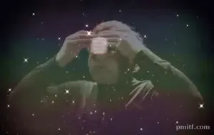 A Man With Glasses Is Surrounded By A Glowing Circle And The Website Pmitf.Com Is Displayed Below Him