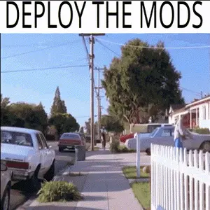 A Picture Of A Street With The Words Deploy The Mods On The Top
