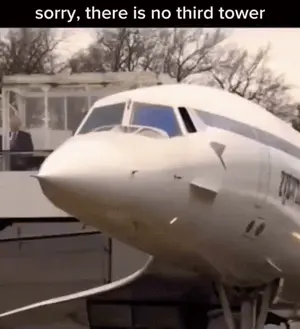 A White Airplane With The Words Sorry There Is No Third Tower On The Bottom