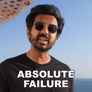 A Man Wearing Sunglasses Says " Absolute Failure " In Front Of A Pizza