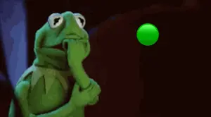 Kermit The Frog Is Looking At A Green Object